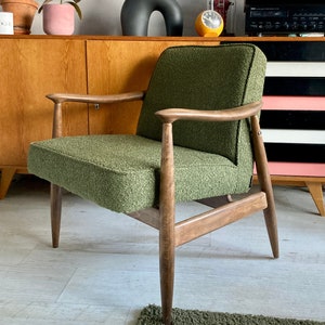 An original vintage polish chair GFM-87 designed in 1965 by Juliusz Kędziorek in a green boucle fabric