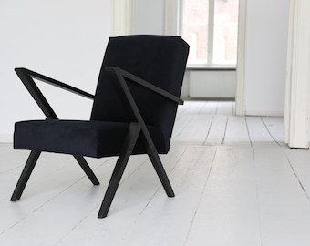 Original midcentury polish armchair from the 60's in black velvet and black wooden frame