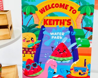 May include: A colorful welcome sign for a water park party with the text "Welcome to Keith's Water Park". The sign features cartoon characters of a pineapple, watermelon, and a lemon wearing sunglasses and a snorkel.