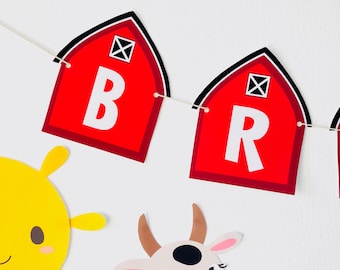 Puede incluir: Una pancarta roja y blanca en forma de granero con las letras "B" y "R" en ella. La pancarta está colgada con una cuerda blanca. Hay un sol amarillo y una vaca blanca con manchas negras en el fondo.