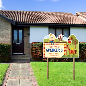 May include: A colorful welcome sign for a birthday party with the text "Welcome to Spencer's Humpty Dumpty Royal Party". The sign features a cartoon Humpty Dumpty, a castle, a horse, and a chick.