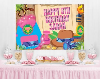 May include: A pink and blue birthday party backdrop with a jungle theme. The backdrop features a snake, a hat, a backpack, and the text "Happy 6th Birthday Sarah".