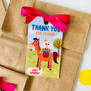 Peut inclure: Une &eacute;tiquette de remerciement avec une illustration de dessin anim&eacute; d'un personnage d'&oelig;uf &agrave; cheval. L'&eacute;tiquette porte le texte "Thank You For Coming!" et "Love: Spencer".