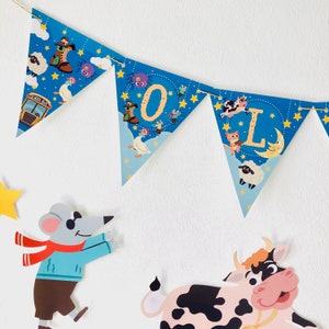 May include: A blue and white banner with the letters "OL" in a whimsical font. The banner is decorated with stars, a school bus, a spider, a cow, a cat, and a sheep. The banner is perfect for a child's birthday party or other celebration.