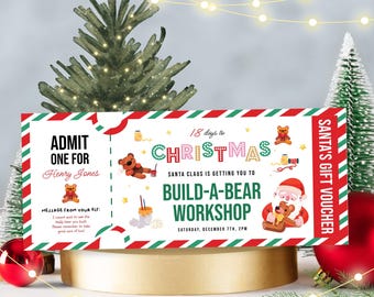 May include: A festive Christmas gift voucher with a red and green striped border. The voucher states "Admit One For Henry Jones" and "Santa's Gift Voucher." The design features teddy bears, Santa Claus, and the text "Build-A-Bear Workshop."