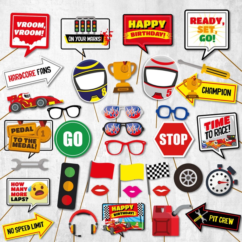 May include: A set of 20 colorful photo booth props with a racing theme. The props include a checkered flag, a stop sign, a trophy, a gas can, a wrench, a steering wheel, a race car, a pair of sunglasses, a pair of glasses, a helmet, a traffic light, a set of lips, a speech bubble with the text "Vroom, Vroom!" and a speech bubble with the text "Happy Birthday!"