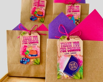 May include: Four brown paper bags with pink and purple tissue paper inside. Each bag has a pink and white tag attached with the text "Thank You For Coming Love, Sarah" and a different image on each tag.