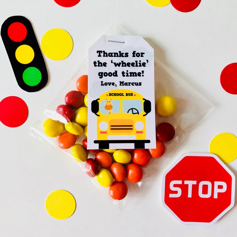Wheels on the Bus "Thanks for the wheelie good time" personalized thank you favor tag with yellow school bus design and party props