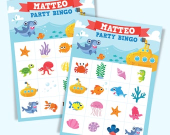 May include: Two blue and white bingo cards with the name Matteo and the words Party Bingo. The cards feature various sea creatures including a shark, octopus, turtle, crab, fish, jellyfish, starfish, seashells, and a submarine.
