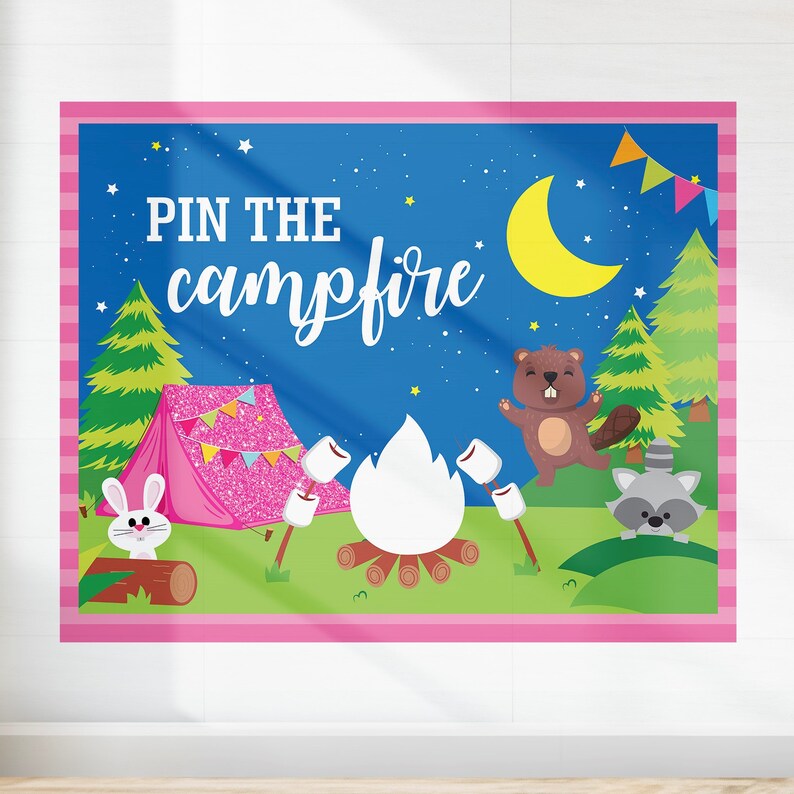 May include: A pink and blue camping themed game backdrop with the text "PIN THE campfire" and illustrations of a tent, a campfire, a beaver, a raccoon, and a rabbit.