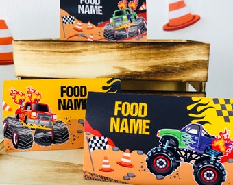 May include: Three printable food labels featuring monster trucks with flames and the text "Food Name". The labels are yellow, black and orange with a monster truck design.