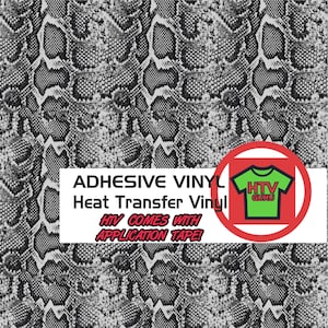 May include: Black and white snake skin patterned heat transfer vinyl. The vinyl is adhesive and comes with application tape. The text "HTV GURU" is on a green t-shirt in a red circle.