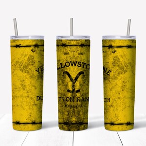 May include: Three yellow stainless steel tumblers with a distressed, vintage look. Each tumbler features a black barbed wire design, a black Yellowstone logo, and a black Y with a black outline. The middle tumbler reads "Yellowstone Dutton Ranch Montana".