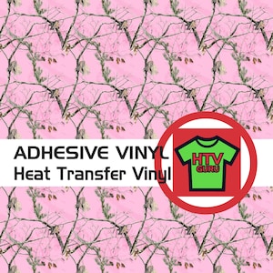 May include: Pink camouflage pattern vinyl with branches and leaves. The text "ADHESIVE VINYL Heat Transfer Vinyl" is displayed in white. A logo with a green t-shirt and the text "HTV GURU" is in the lower right corner.