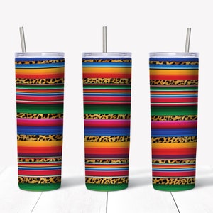 May include: Three stainless steel tumblers with colorful striped designs and leopard print accents. The tumblers have lids and straws.