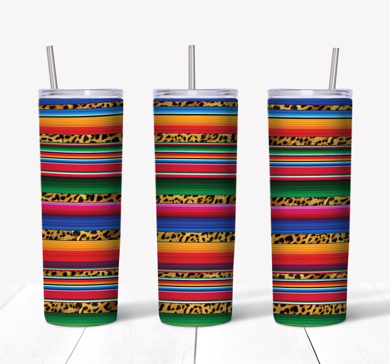 May include: Three stainless steel tumblers with colorful striped designs and leopard print accents. The tumblers have lids and straws.