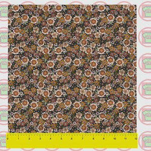 May include: A seamless pattern featuring a variety of small flowers in shades of brown, orange, and white on a black background.