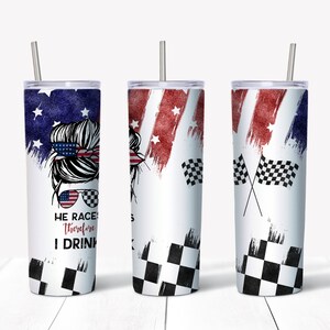 May include: Three white tumblers with a red, white, and blue American flag design. The tumblers have a black and white checkered pattern at the bottom. The middle tumbler has a woman's face with a bun and sunglasses. The text on the tumbler reads "He Races Therefore I Drink".