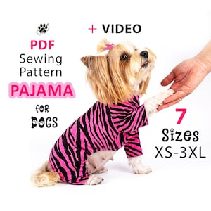 May include: A dog wearing pink and black zebra-print pajamas. Text on the image reads: PDF Sewing Pattern PAJAMA for DOGS + VIDEO 7 Sizes XS-3XL. The dog has long tan fur and a small pink bow on its head, shown in a seated position.