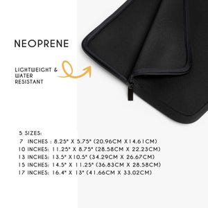 a close up of a laptop bag with measurements