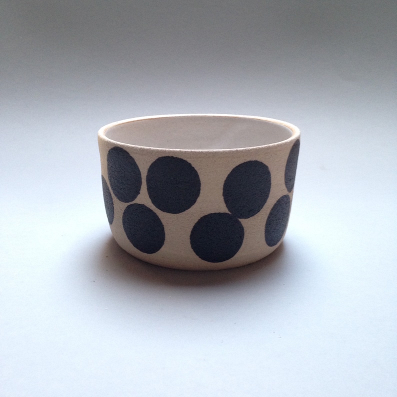 planter bowl with black spots
