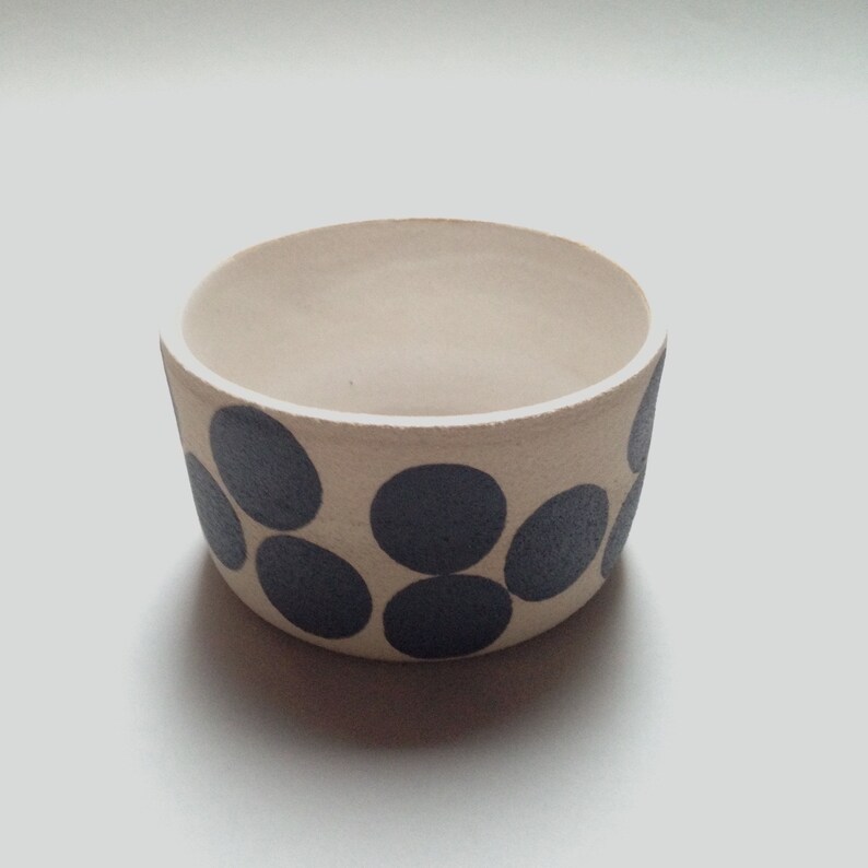 planter bowl with black spots