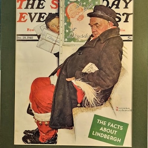 May include: A framed print of a 1940 Saturday Evening Post magazine cover by Norman Rockwell. It depicts a person dressed as Santa Claus in a black coat and red trousers sitting on a train, with a child peeking from behind a newspaper advertisement.