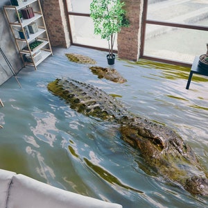 May include: Two large alligators swimming in a flooded living room. The room has a bookshelf, a plant, and a window. The water is murky and the alligators are partially submerged.