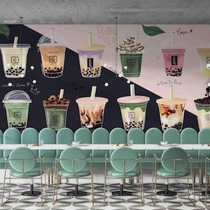 May include: A mural featuring various illustrated bubble tea drinks in clear cups with straws. The background is a dark blue with the words "Bubble Tea" and "Milk Tea". Below are teal booths and gold chairs in a restaurant setting.