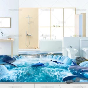 May include: A 3D floor mural featuring a vibrant waterfall scene with rushing blue water, rocky edges, and several dolphins swimming through the rapids. The floor design creates an illusion of depth, transforming the bathroom floor into a dynamic aquatic landscape.