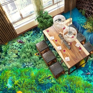 May include: A rectangular wooden dining table with a natural grain finish, surrounded by six square stools with dark textured seats. The floor features a high-definition 3D print of a vibrant coral reef with green anemones and tropical fish.