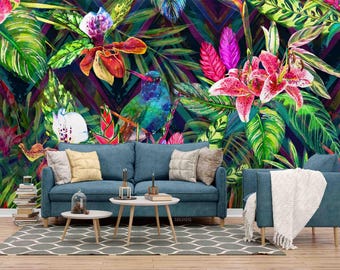 May include: A vibrant watercolor mural featuring a tropical scene with lush green foliage, colorful flowers, and a hummingbird. The mural serves as a backdrop for a blue sofa, accent chair, and coffee tables, creating a lively interior design.