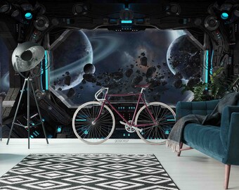 May include: A dark blue couch with a throw blanket sits in front of a wall mural depicting a spaceship window view of space with planets and asteroids. A vintage-style lamp and a bicycle are also in the scene.