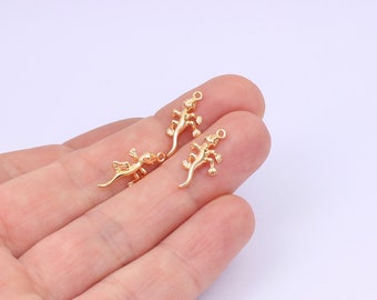 May include: Three gold-colored lizard charms with a loop for attaching to jewelry or other crafts.