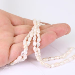 1/2 x 14 Inch Strand of Natural Freshwater Pearls, Medium Rice Shape, by Jewellery Making Supplies London ( JMSLondonCo )