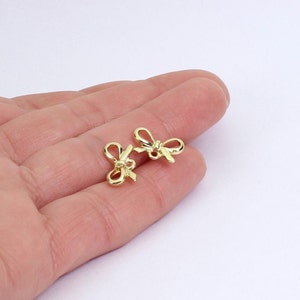 3/6/12 x Pairs of Bowknot Stud Earring Blanks with Loops, Gold Tone Plated Alloy, Ear Nuts Included, 14mm x 8mm, by JMSLondonCo.