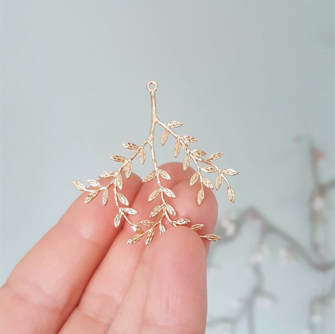 2-4-8-x-branch-pendants-gold-plated-with-tiny-leaves-48mm-x-42mm-by
