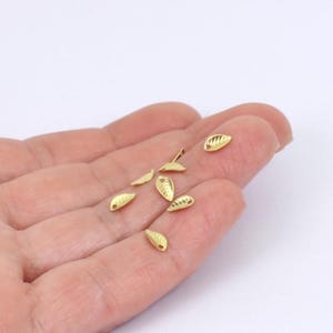 50/100/200/400 x Tiny Raw Brass Leaf Charms, 7mm x 4mm, by Jewellery Making Supplies London ( JMSLondonCo )