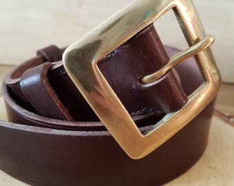 Ethnic very chic! such as sculptures 1980/'s Large brown leather belt adorned with three imposing African gold brass masks