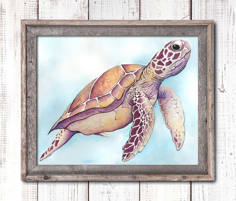 May include: Watercolor painting of a sea turtle in a rustic gray wooden frame. The turtle has a light brown shell with purple and yellow accents. The background is a light blue, creating a serene underwater scene.