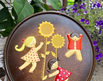 MCM Bakelite Decorative Plate/ Playing children and sunflowers plate