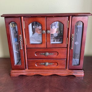 Vintage Wooden Jewelry Armoire: Rings Holder-Open Sides Compartments with 12 Hooks-2 Drawers- Mirrored Background-Gray Lining- Etched Doors