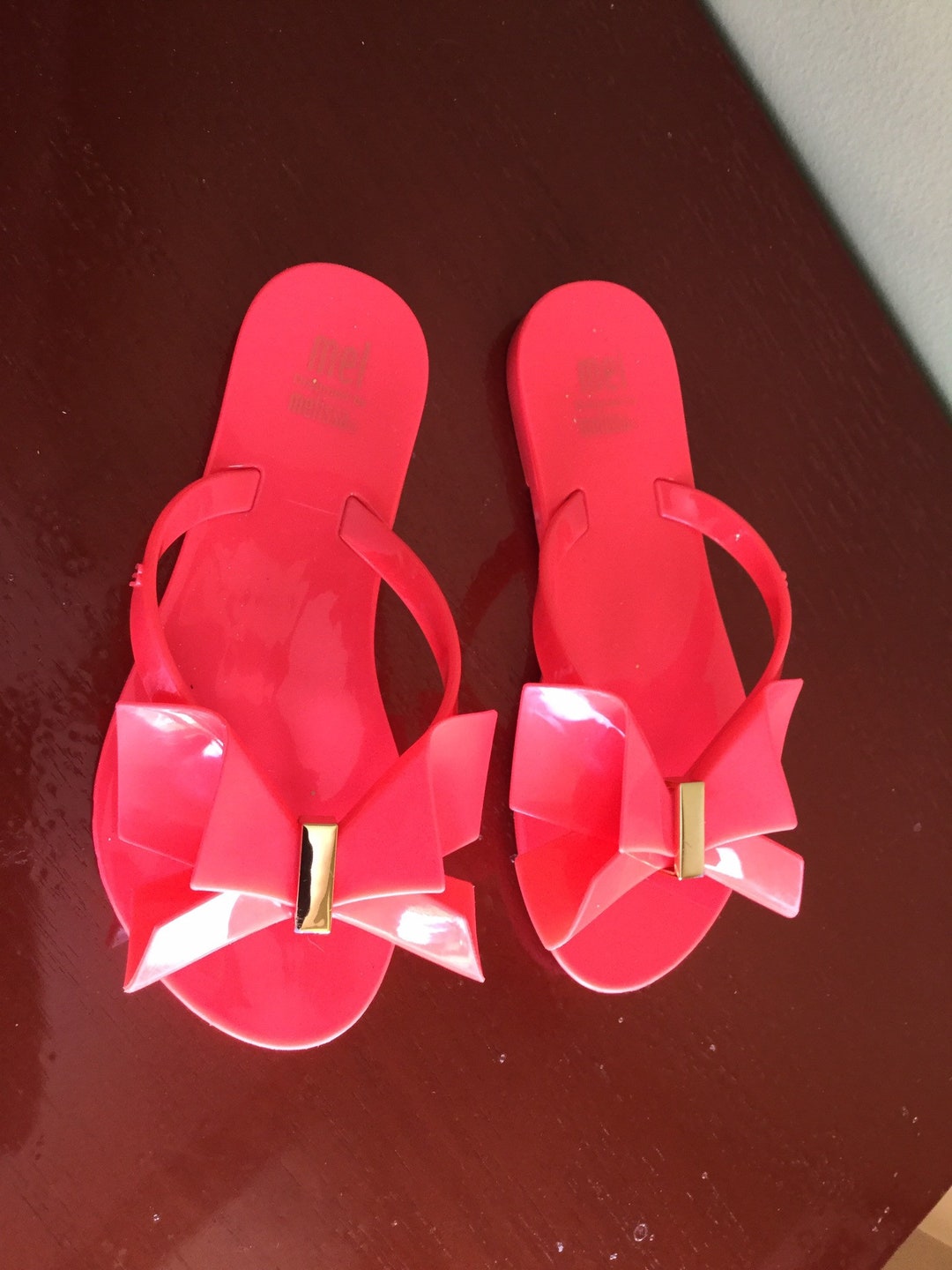 red rubber flip flops