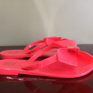 red rubber flip flops