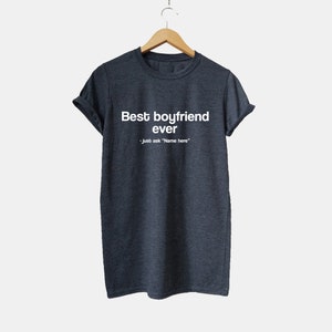 May include: A dark gray t-shirt with the text "Best boyfriend ever" and "Just ask "Name here"" in white.