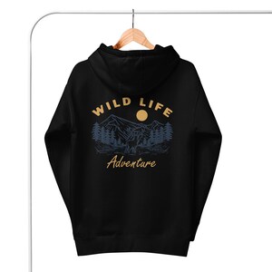 May include: Black hooded sweatshirt with a graphic print of a deer in a forest scene. The text "WILD LIFE Adventure" is printed on the back of the sweatshirt.