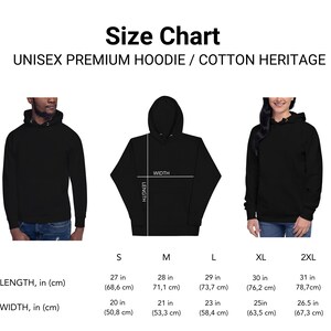 May include: Size chart for a unisex premium hoodie. The chart shows measurements in inches and centimeters for sizes S, M, L, XL, and 2XL. The chart includes measurements for length and width.