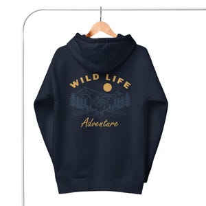 May include: Navy blue hoodie with a yellow and white graphic on the back that says "WILD LIFE Adventure" with a mountain and a sun graphic.