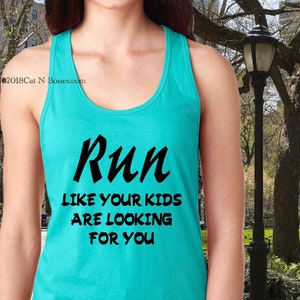May include: A turquoise tank top with the text "Run like your kids are looking for you" printed in black.