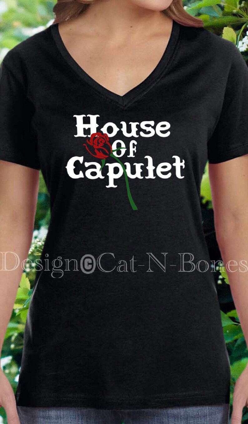 May include: Black v-neck t-shirt with white text that reads "House of Capulet" and a red rose graphic.